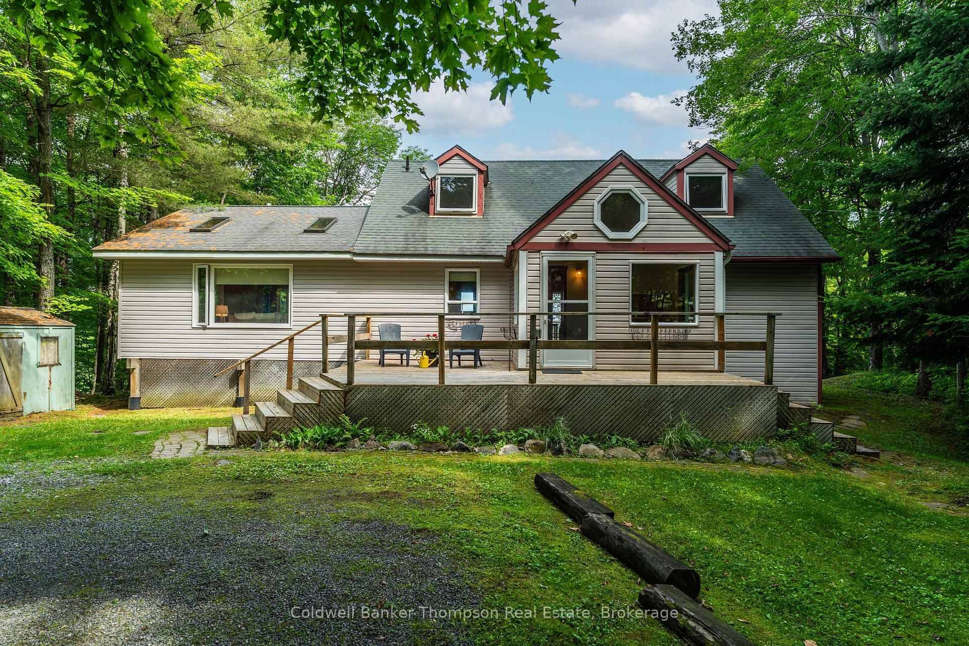 Experience the most spectacular views of Mary Lake from this spacious family residence in Port Sydney !