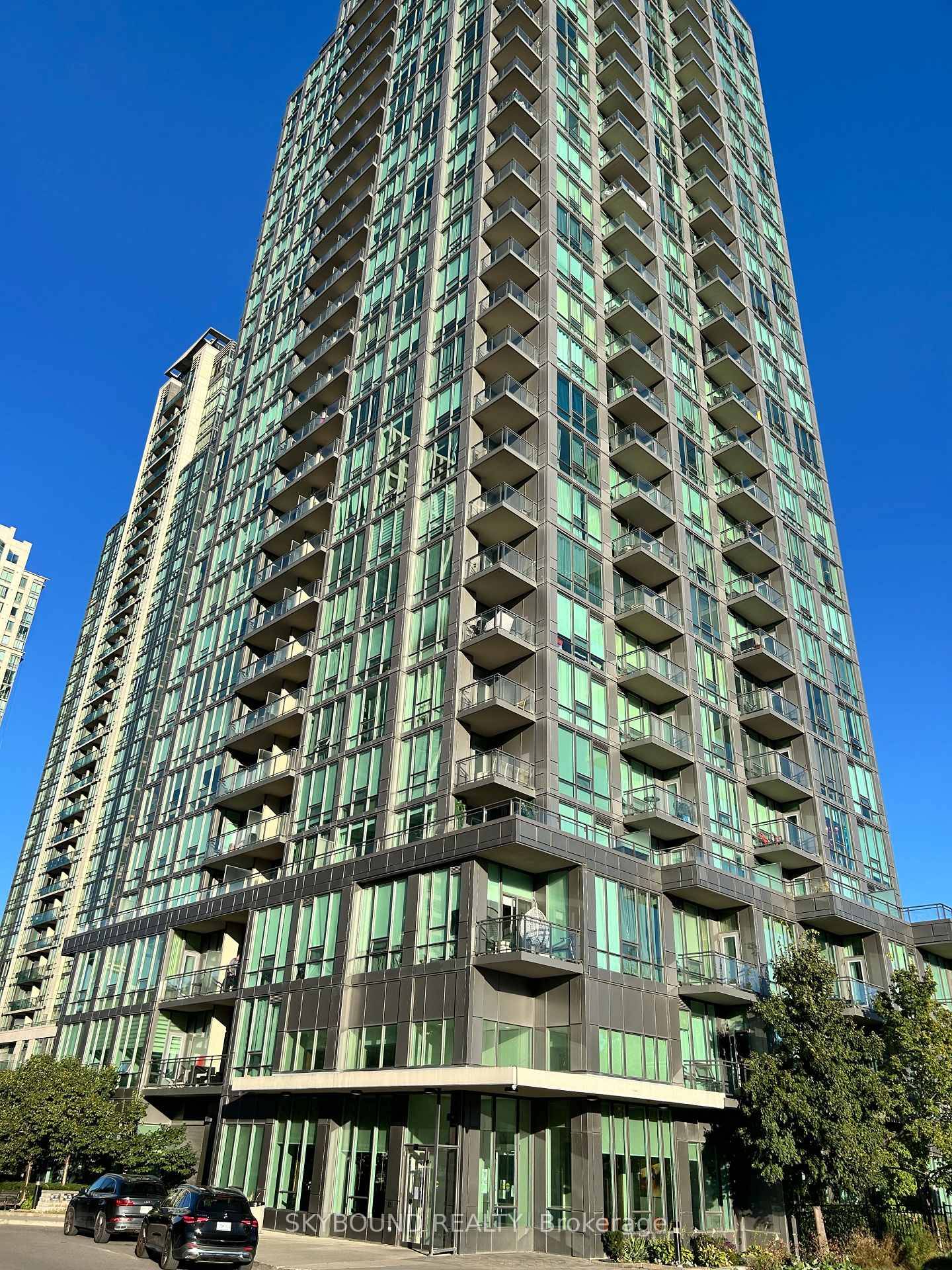 Stunning Corner Suite with your own private HUGE 700 sqft TERRACE and 2 side by side parking spots !