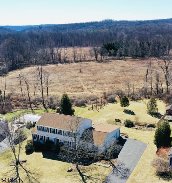 Your search ends here ! Located in a lovely neighborhood setting, backing up to parkland, this four bedroom, 2.