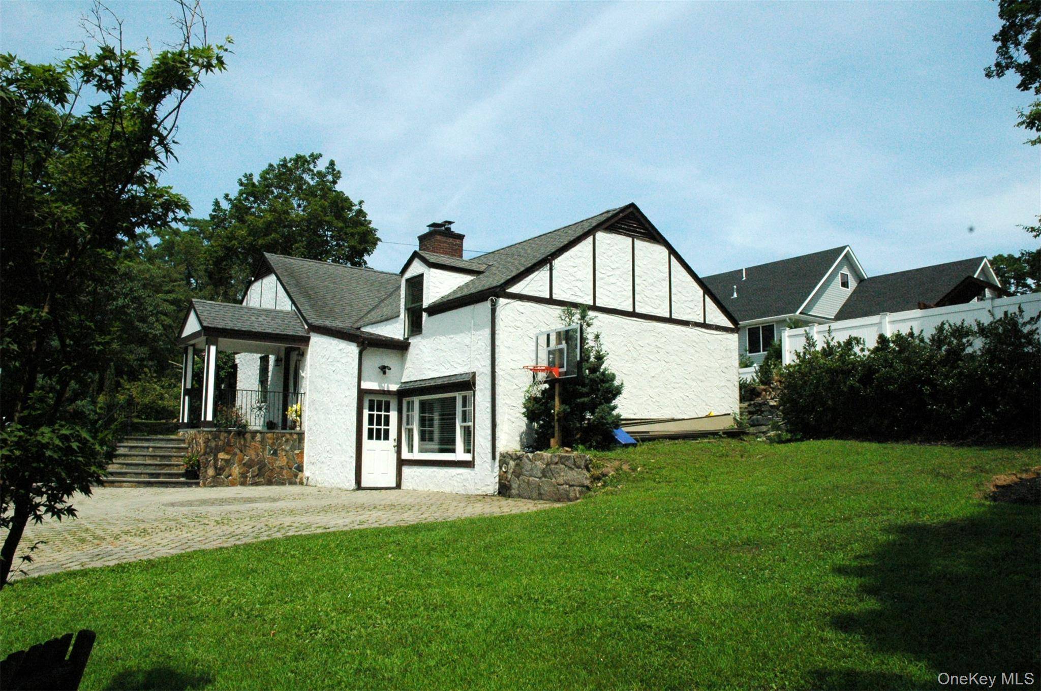 A Beautiful 1500 Square Feet Two Story Private Cottage and a Basement, including Kitchen, Dinning Room, and a Living Room, located in Town of Armonk.