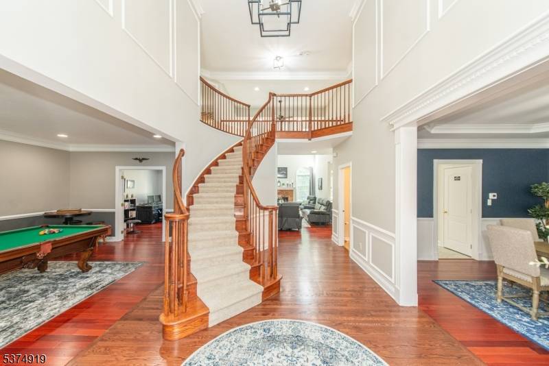 Welcome to this stately Toll Bros Colonial in the highly desirable Riding Meadows section of Long Valley.
