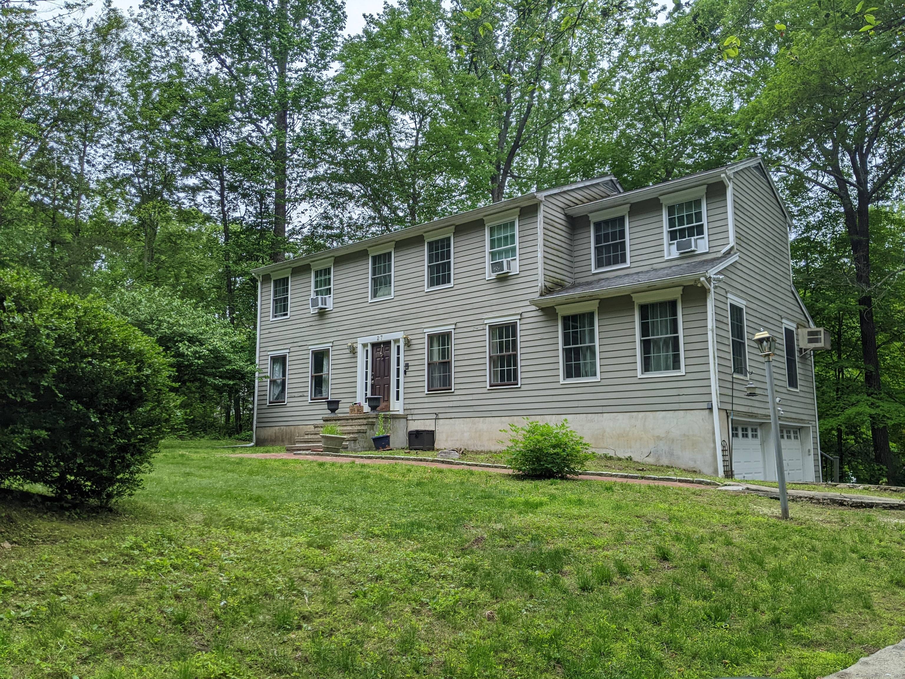 Located in Sleepy Hollow Estates this traditional center hall colonial offers ample room and excellent storage space in a quiet private setting bordering the Wolfpits 700 Acre Nature Preserve.