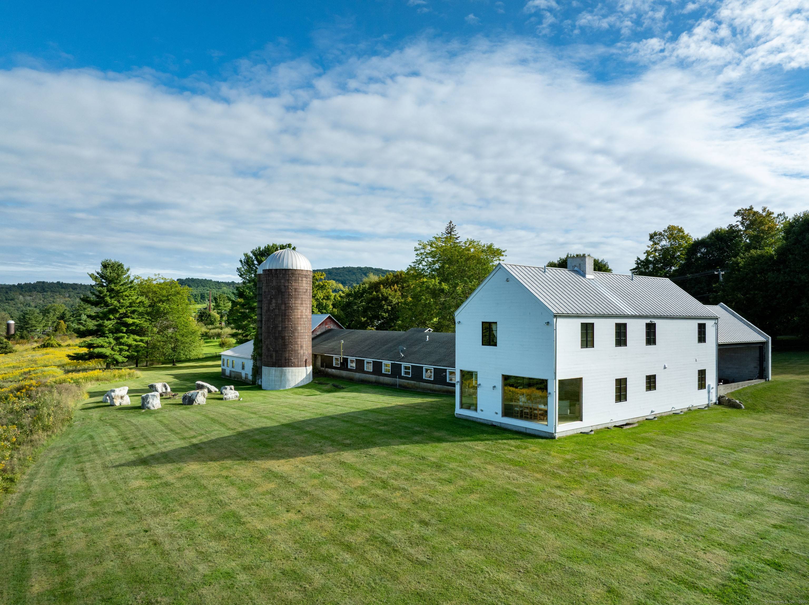 Meticulously designed modern farmhouse set on 10.