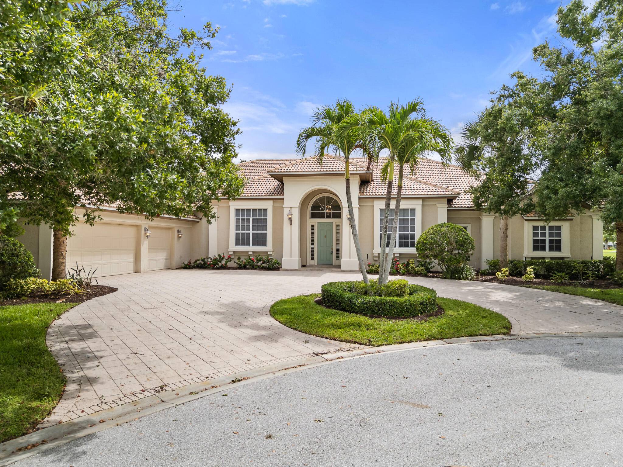 CUSTOM BUILT 4 BEDROOM, 3 BATHHOME ON LOVELY 1 2 ACRE LOT ON QUITE CUL DE SAC IN GATED COMMUNITY LOCATED ON THE 11TH HOLE OF THE ST.