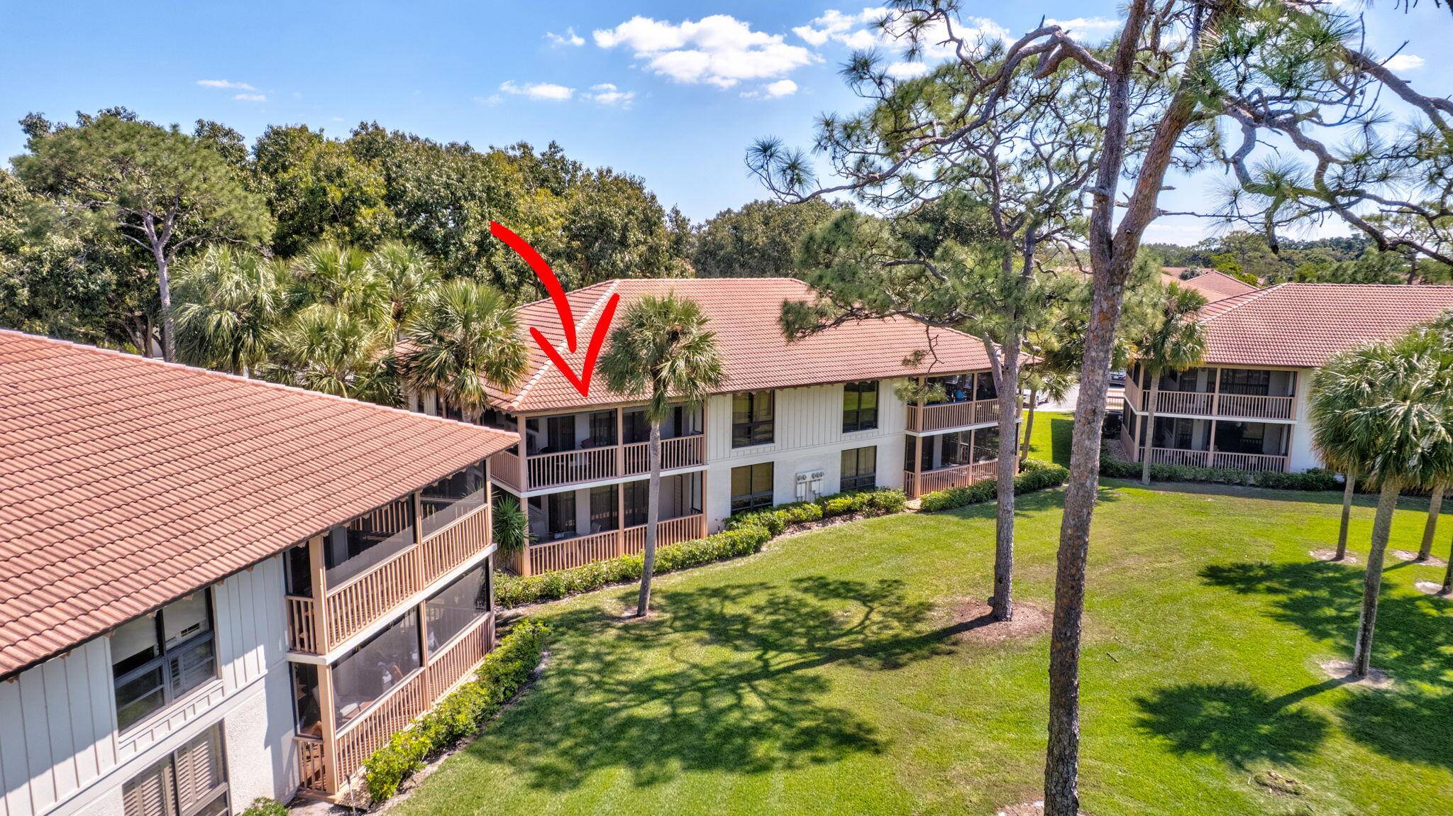 Wonderfully Bright and open second floor condo, with sweeping views of the 2nd hole of the championship golf course at PGA National.