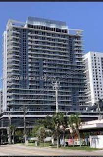 Unit 1509 at 1010 SW 2nd Ave offers a modern and spacious 2 2.