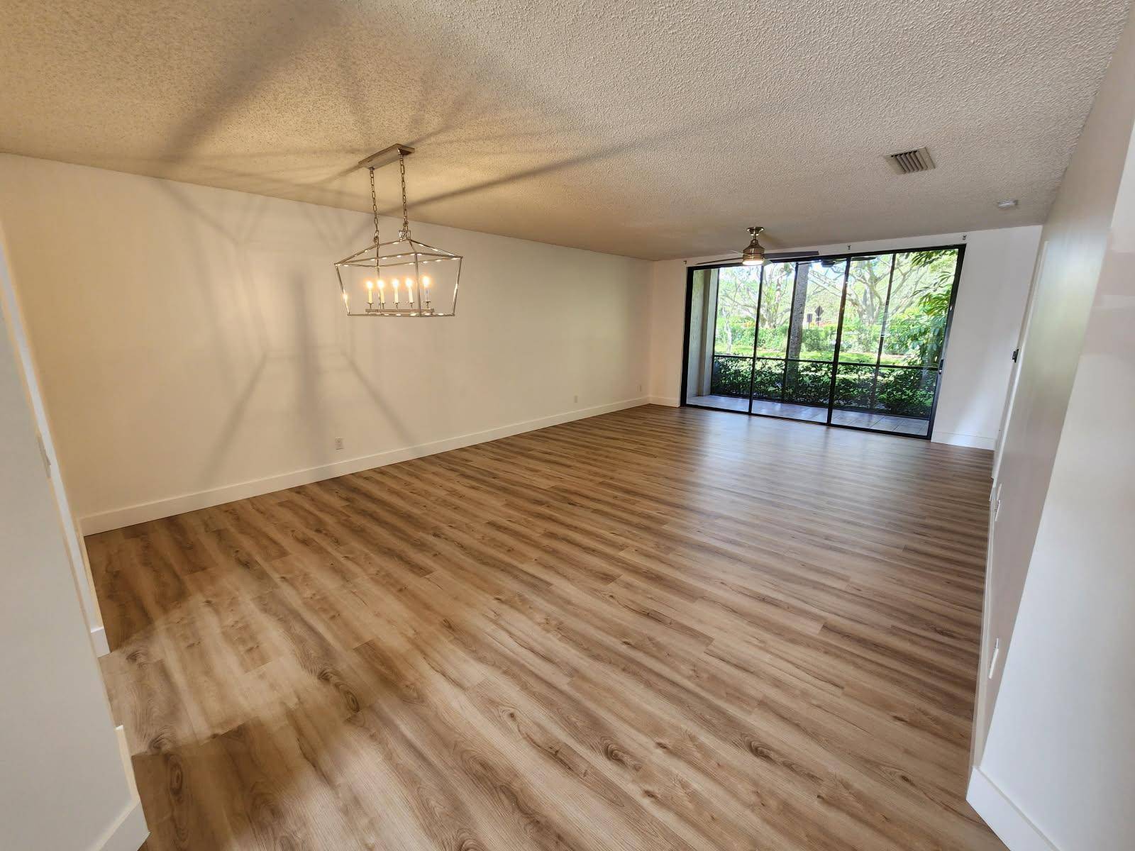 New pictures ! Completely renovated first floor unit in popular Dunbar Woods community.