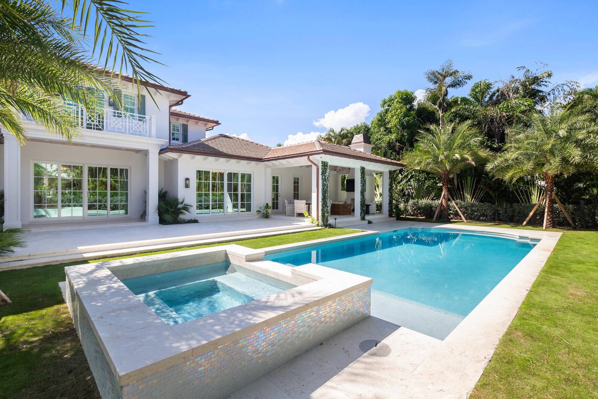 This luxurious new construction home is located on the north end of Palm Beach and showcases exceptional interior design by Ellen Kavanaugh.