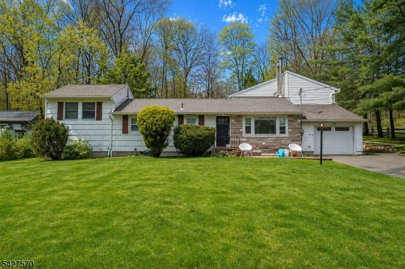 Welcome to 44 Venetian Drive, a truly unique custom home offering flexible living space and endless possibilities in the desirable Lake Hopatcong area.