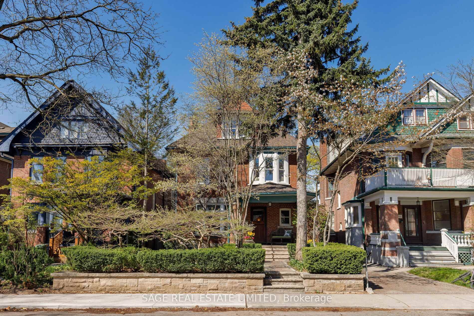 Exquisitely restored circa 1906 Edwardian beauty nestled on the grandest block of Palmerston Boulevard.