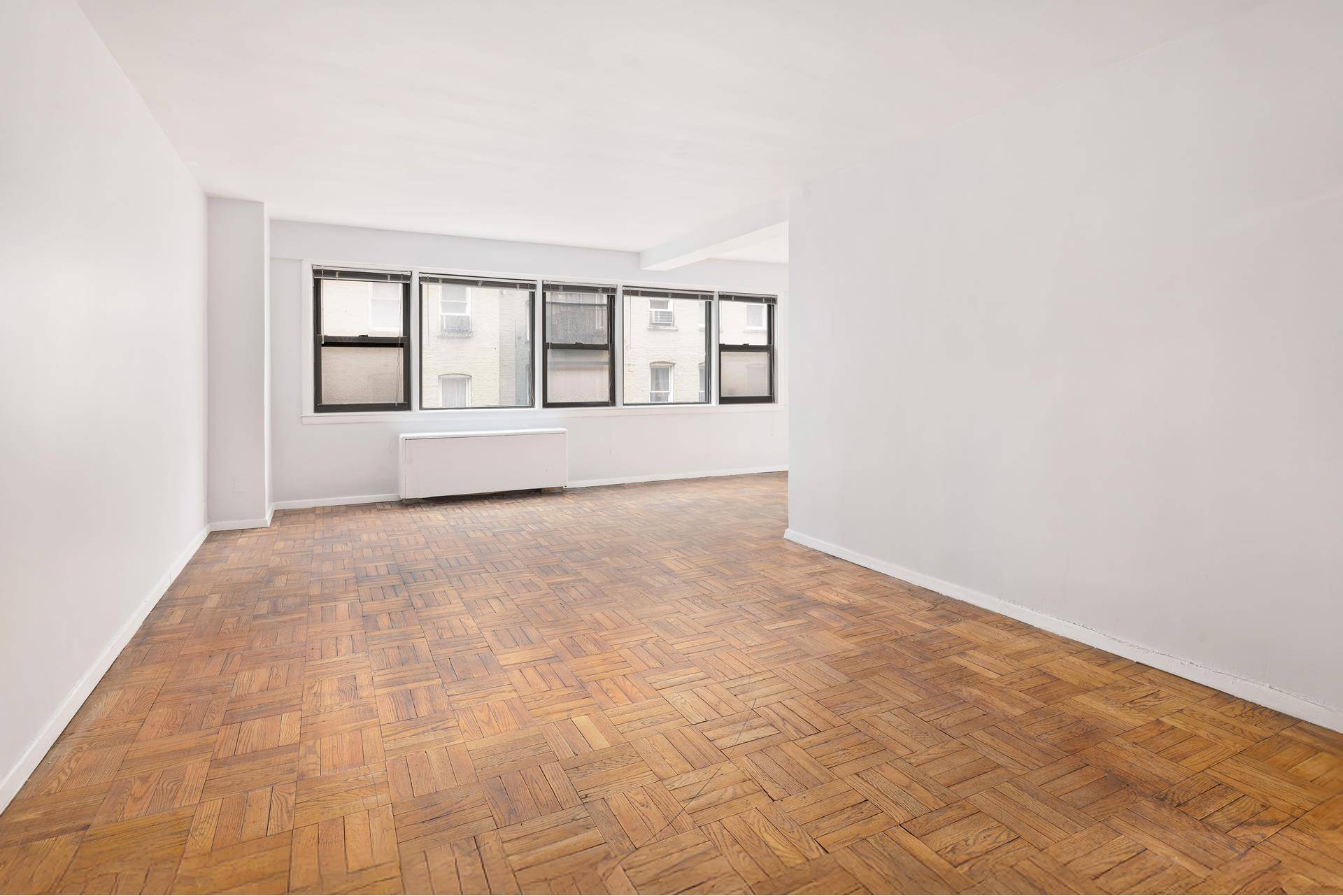 Welcome home to Apt 4A a Sun Flooded New Updated Versatile Apartment designed for maximum functionality as an Alcove Studio or a Convertible One Bedroom.