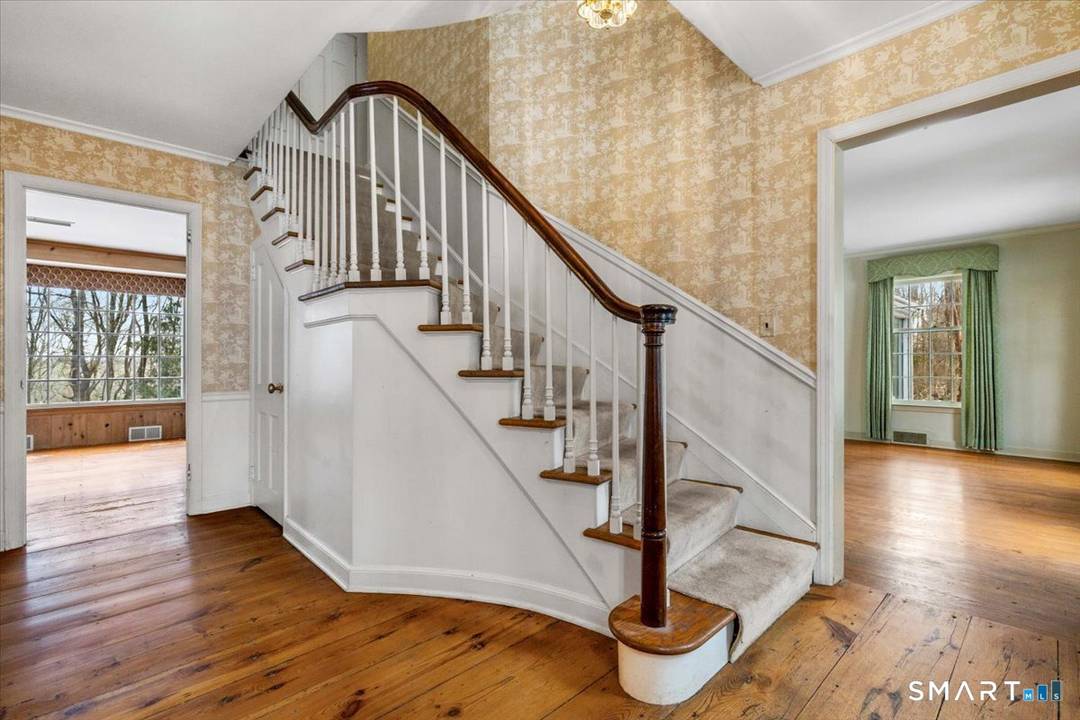 Located on a much sought after cul de sac surrounded by estate properties, 77 Winfield Lane presents a compelling opportunity to re envision a 4, 100 square foot, 5 bedroom, ...