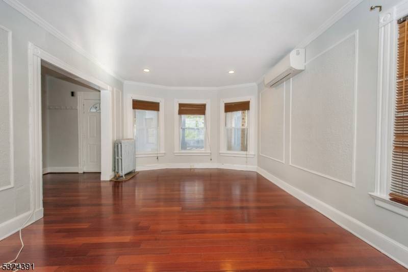 Located across Nishuane Park with tennis courts and community pool, this 4 bedroom 2 full baths house welcomes you througha bright enclosed porch.