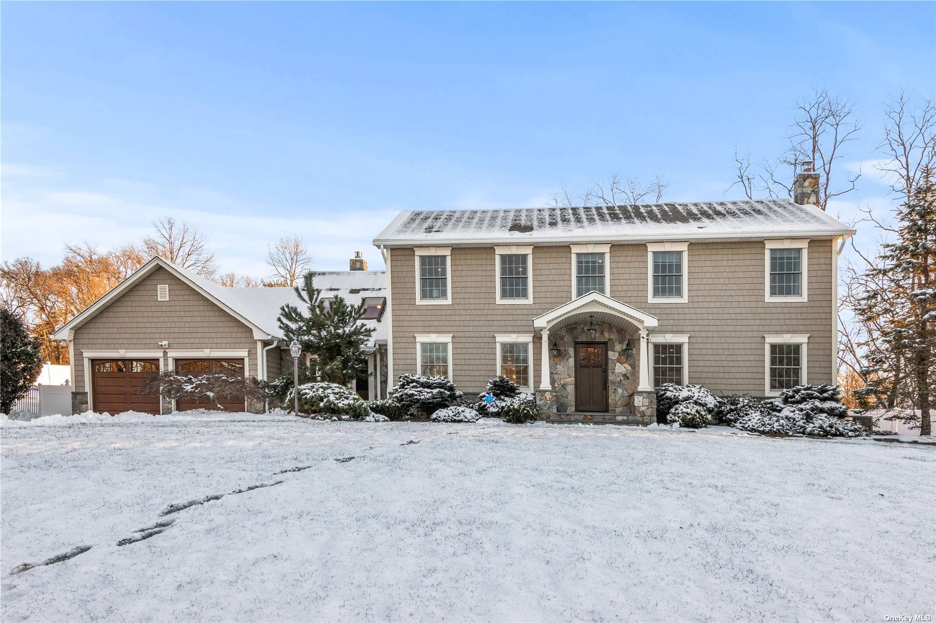 This Fabulous Island Estates Colonial Has Been Recently Renovated with Incredible Attention To Detail and Is One Of The Largest Colonials In The Community.