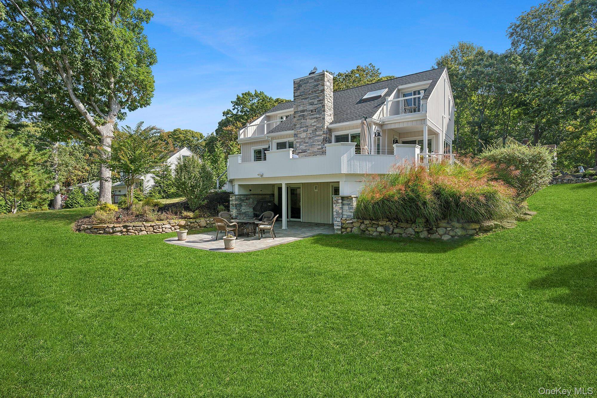 North Fork Coastal Living With Sunset Views Enjoy breathtaking sunsets from any of the three private balconies of this beautiful North Fork retreat.