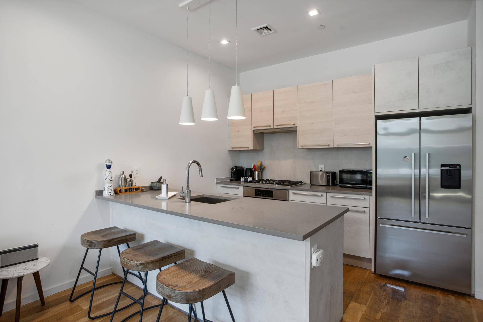 This exquisite duplex apartment offers a perfect blend of modern amenities and charming features, making it a true gem in Brooklyn.