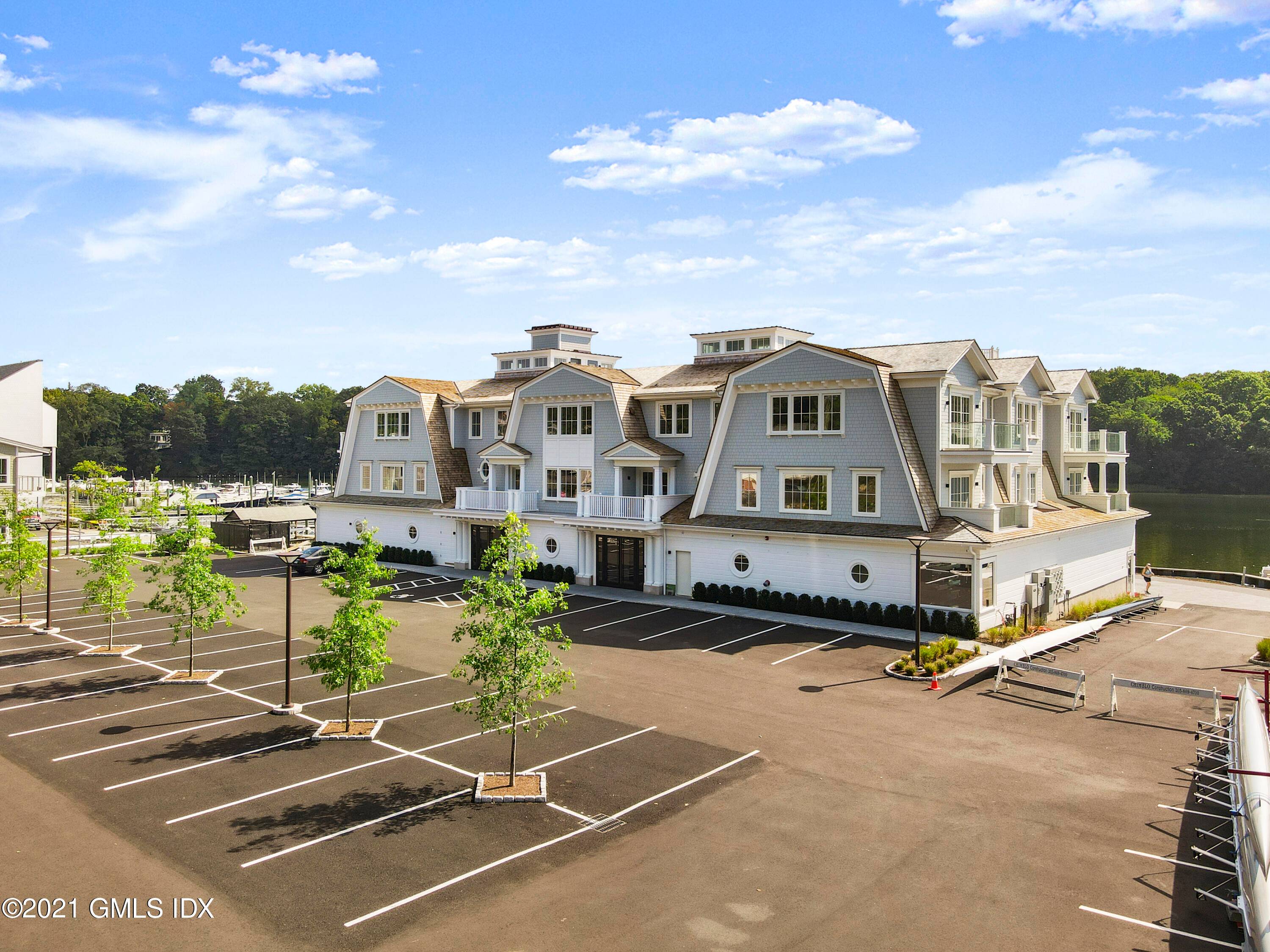 One of a kind direct Waterfront Shingle Style 12 unit condo association just completed and ready for summer occupancy.