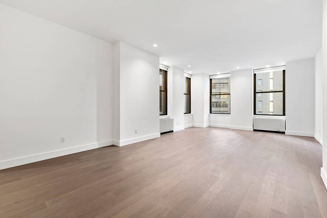 Luxurious Two Bedroom Two Bath Condo Experience urban elegance at The Broad Exchange Building.