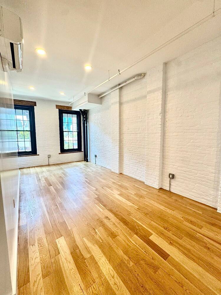 Step into this SoHo style loft where timeless character meets modern luxury.