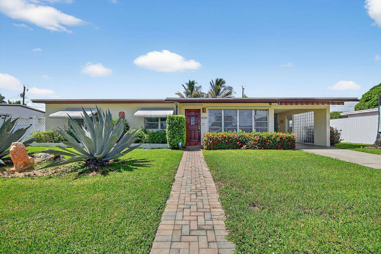 Head into this beautifully maintained three bedroom, two bath home offering approximately 1, 800 sq ft of comfortable living space on a 0.