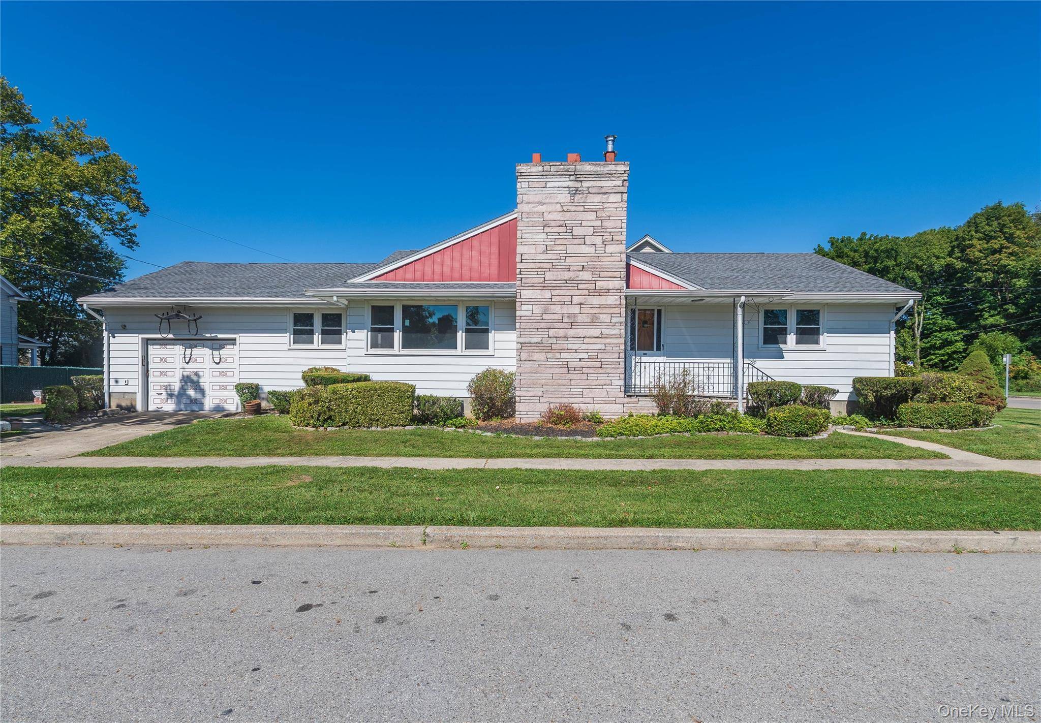 Charming 1955 three bedroom, two bath ranch with modern upgrades in Southside Poughkeepsie.