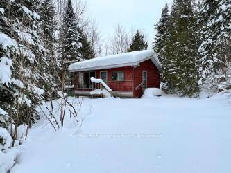 Opportunity knocks ! Check out this 2 bed 1 bath, 3 season cottage with open concept layout.