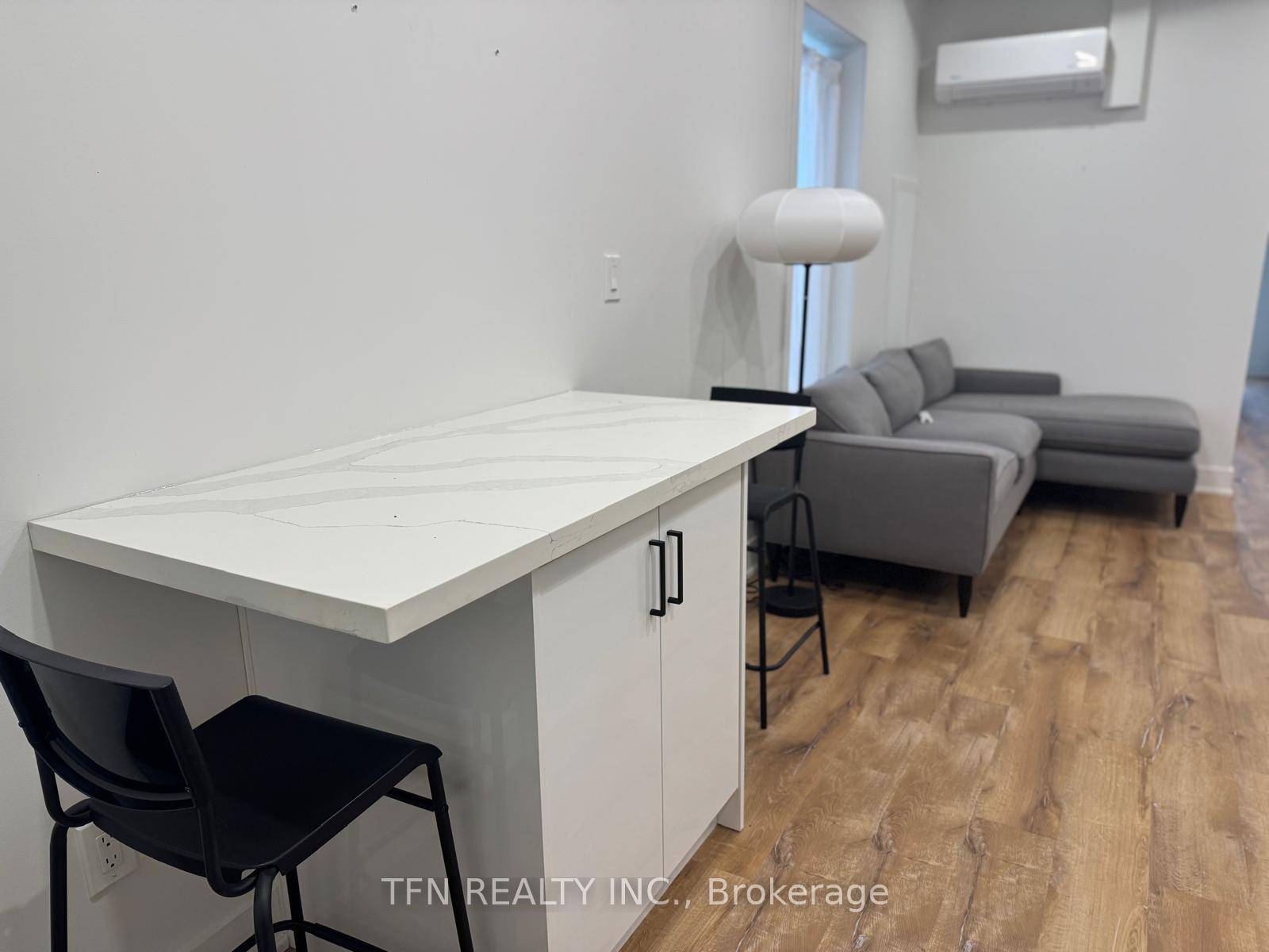 Welcome to this fully renovated 2 bedroom plus a sunroom apartment in the heart of Torontos vibrant Dundas West neighborhood.