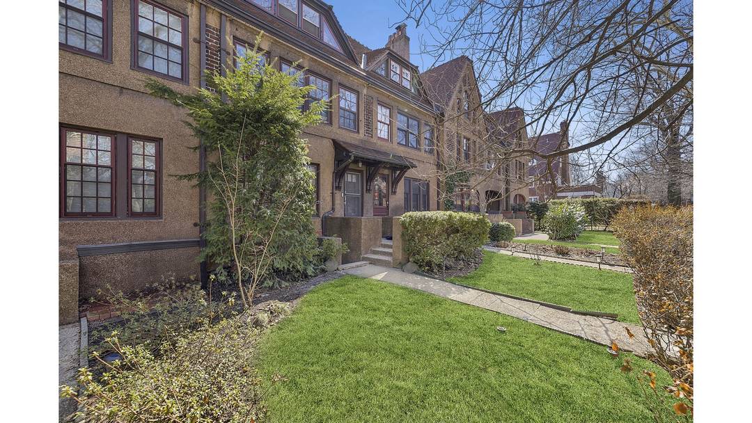 Set on a picturesque, tree lined street in the heart of Forest Hills Gardens, this charming Tudor townhome captures the storybook character and timeless elegance that define the neighborhood.