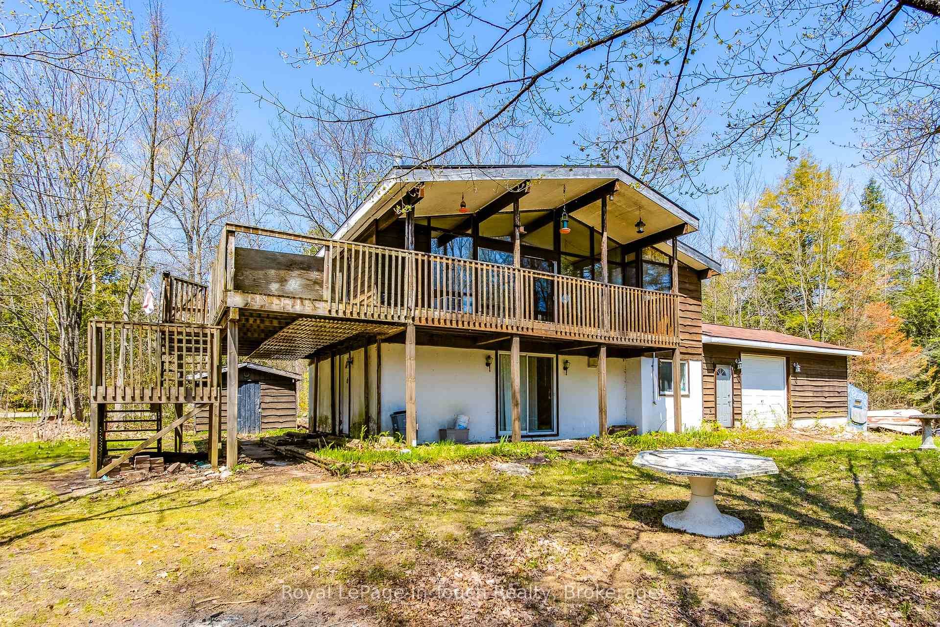 Coutnac Beach, Rare opportunity to purchase an Estate As Is two story and bring it to the limitless potential that it has.