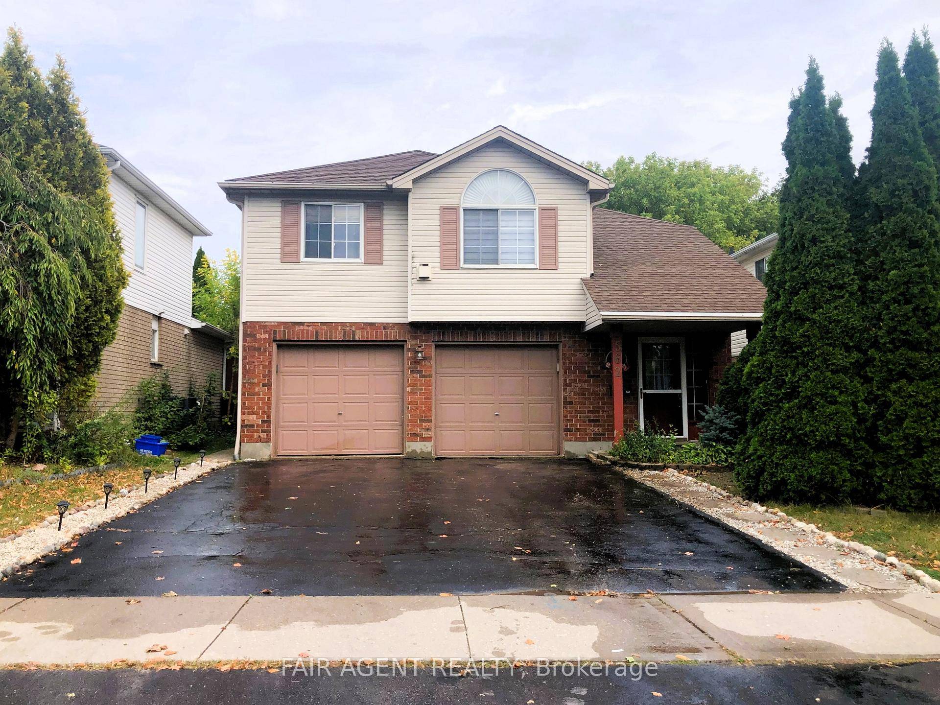 Beautiful raised bungalow with 3 bedrooms, 2 full bathrooms, a walkout basement and a 2 car garage with ample driveway parking space.