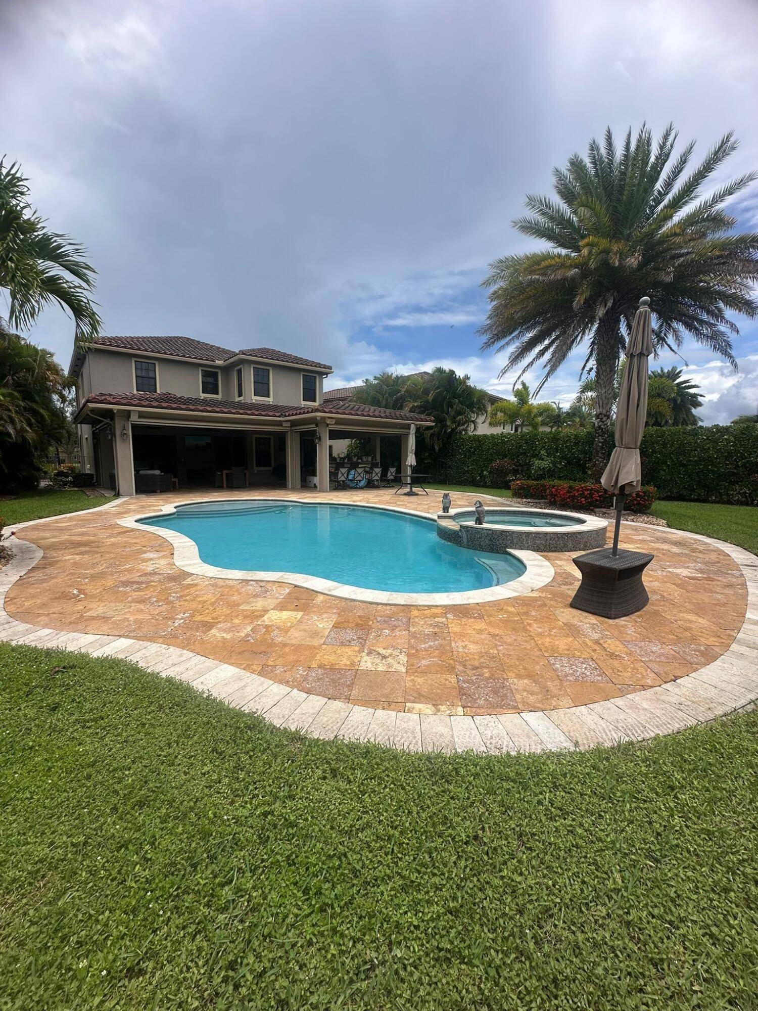This Bright and Stunning 5 Bed 4 Bath Home, with 3 car garage, located on an oversized lot larger than surrounding properties, over 300k in Upgrades, Impact windows, 2 A ...