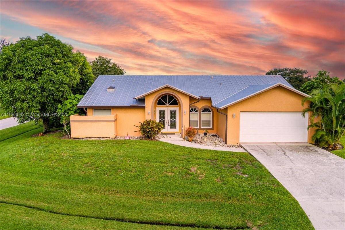 Welcome to this charming 3 bedroom, 2 bath home in Port St.