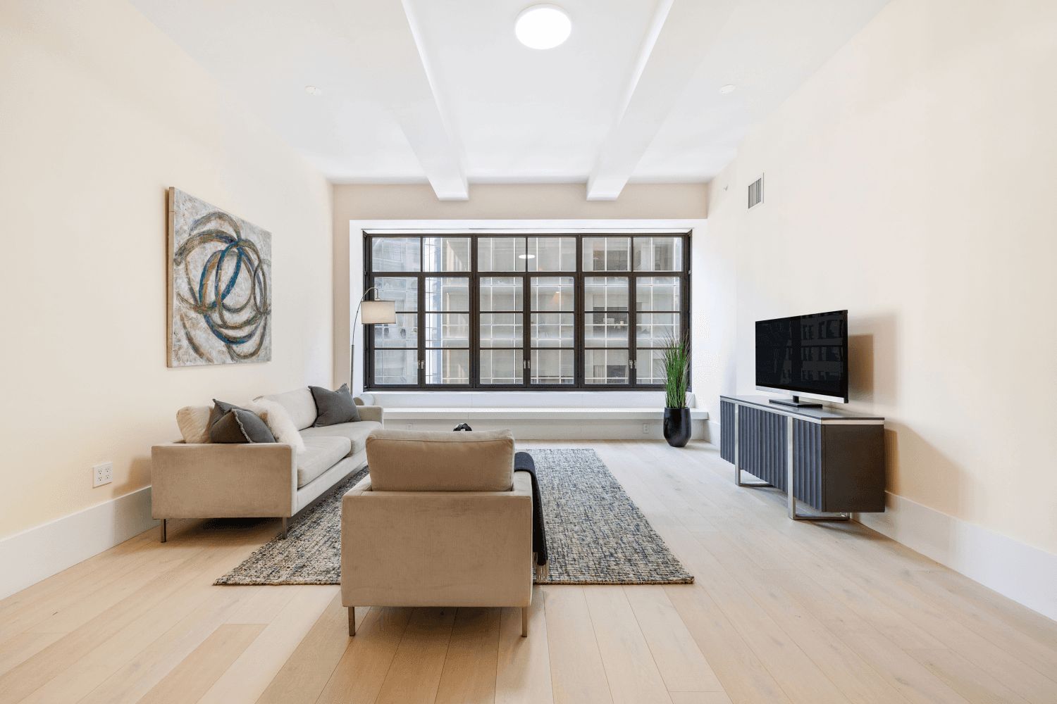 Crafted by renowned designer Piet Boon, this serene three bedroom, two and a half bathroom residence nestled in NoMad boasts striking 11' 5 ceilings and exposures to the south, north, ...