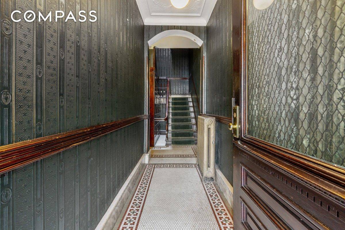 Welcome to 21 42 45th Road a beautifully maintained three family in prime Long Island City.