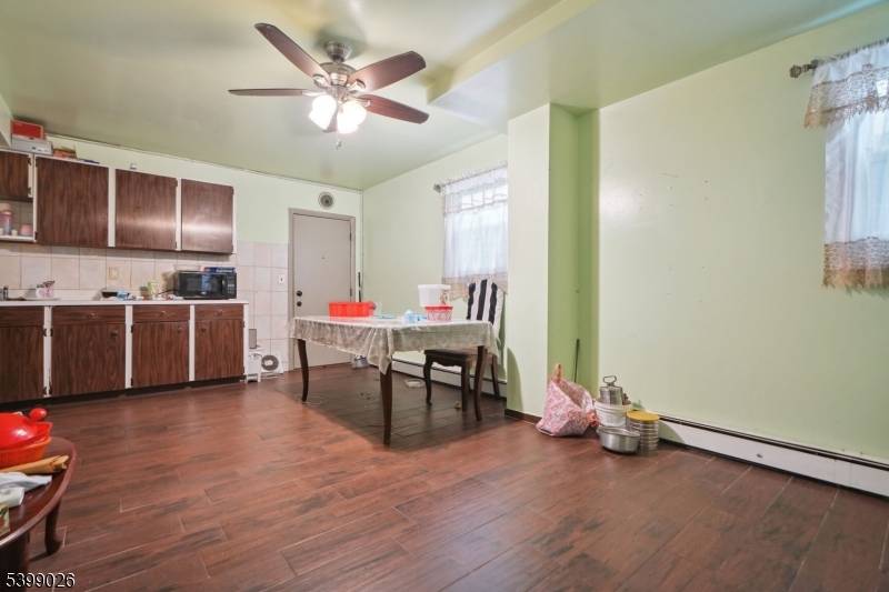 Welcome home to this spacious 4 bed, 2 bath bi level home in highly desirable neighborhood of Paterson near the Woodland Park border.