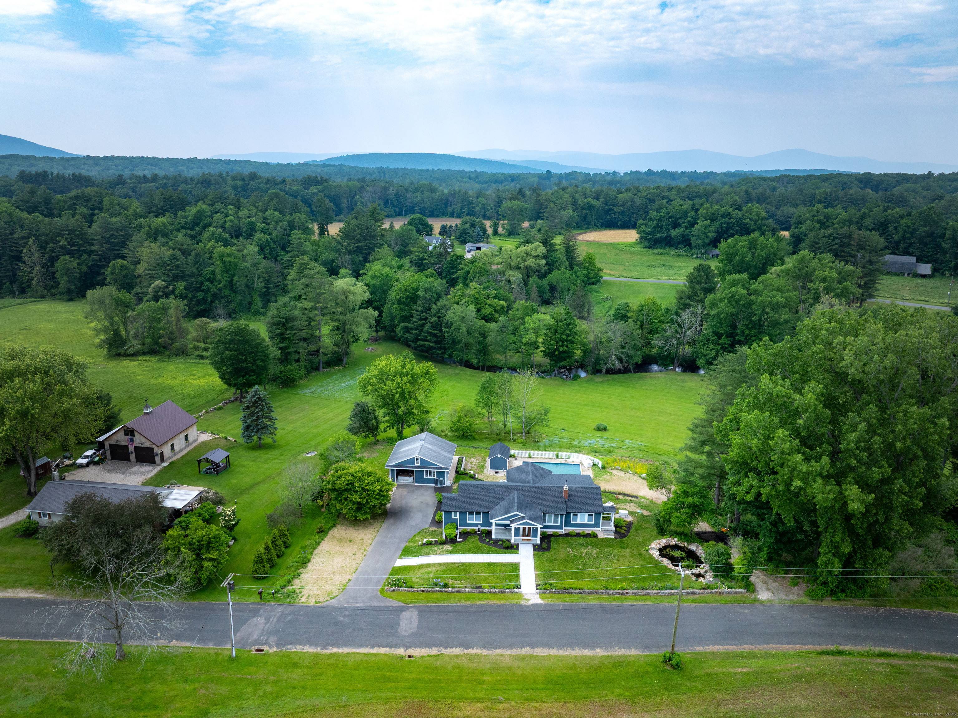 CANAAN VALLEY LUXURY The total renovation of this beautifully located single level home, rebuilt from the foundation up in 2024, has been done with unparalleled taste and style.