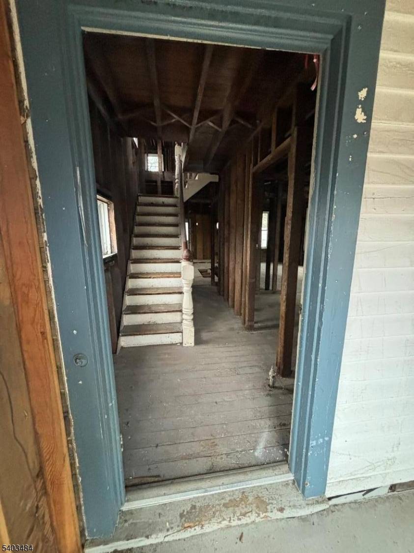 House has been totally gutted on the interior and all asbestos materials have been removed by certified company.