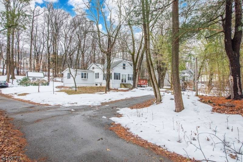 Wonderful 4 bedroom, 2 Bath unique charming home located on a peaceful, bucolic lot.