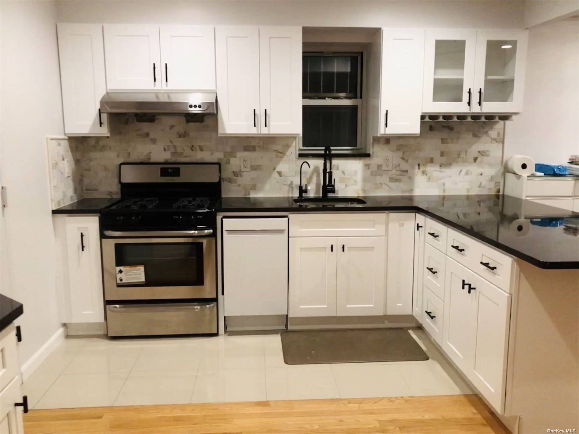 Welcome to this unique 1092 sf duplex condo in the heart of Elmhurst, but in the quiet residential street.