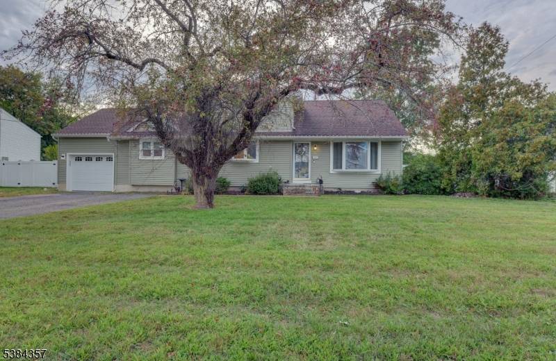 Welcome to this beautifully expanded and renovated split level home, offering over 2000 square feet of living space.