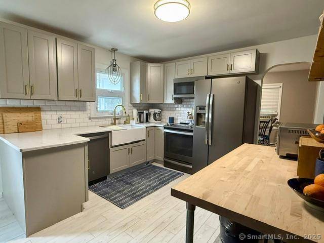 This beautifully maintained home is full of thoughtful updates and coastal charm.