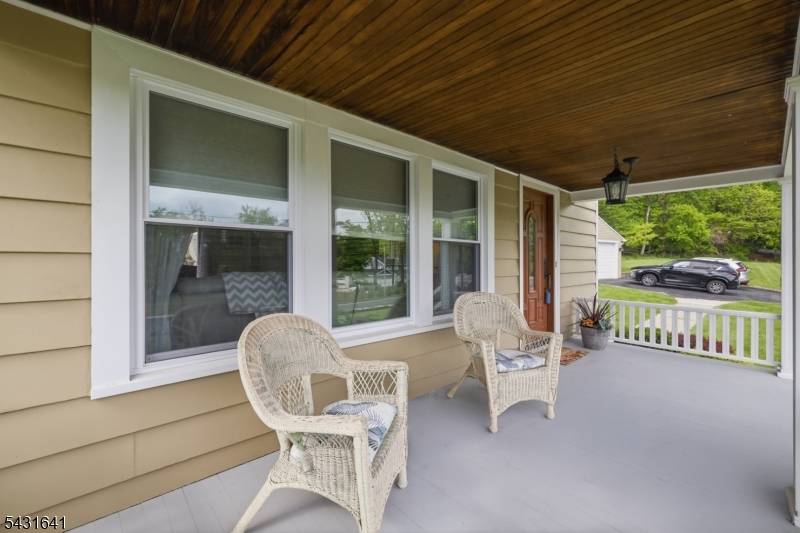 Beautifully updated Craftsman Colonial in prime Warren location offering charm convenience.
