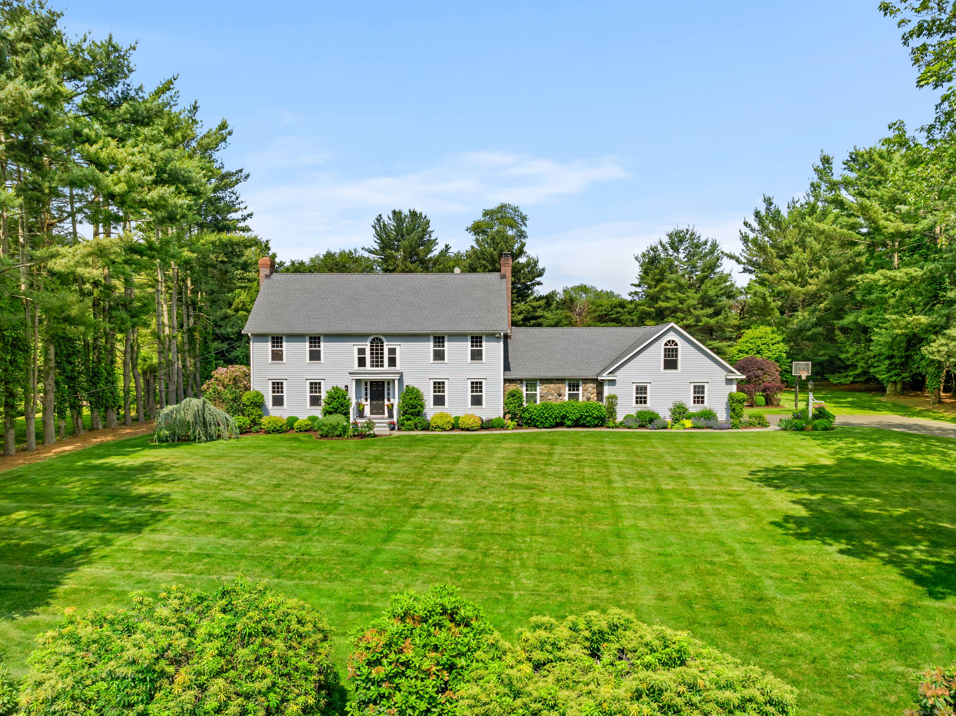 Welcome to this picturesque Connecticut Colonial, an elegant blend of classic charm modern comfort on a sought after cul de sac bordering the prestigious Patterson Club.