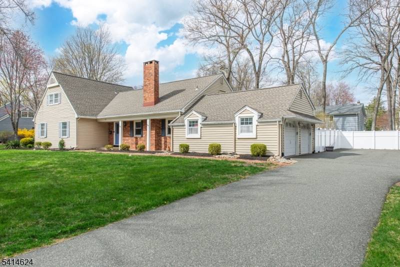 Welcome to this beautifully maintained Expanded Ranch in the highly sought after community of Morris Plains.