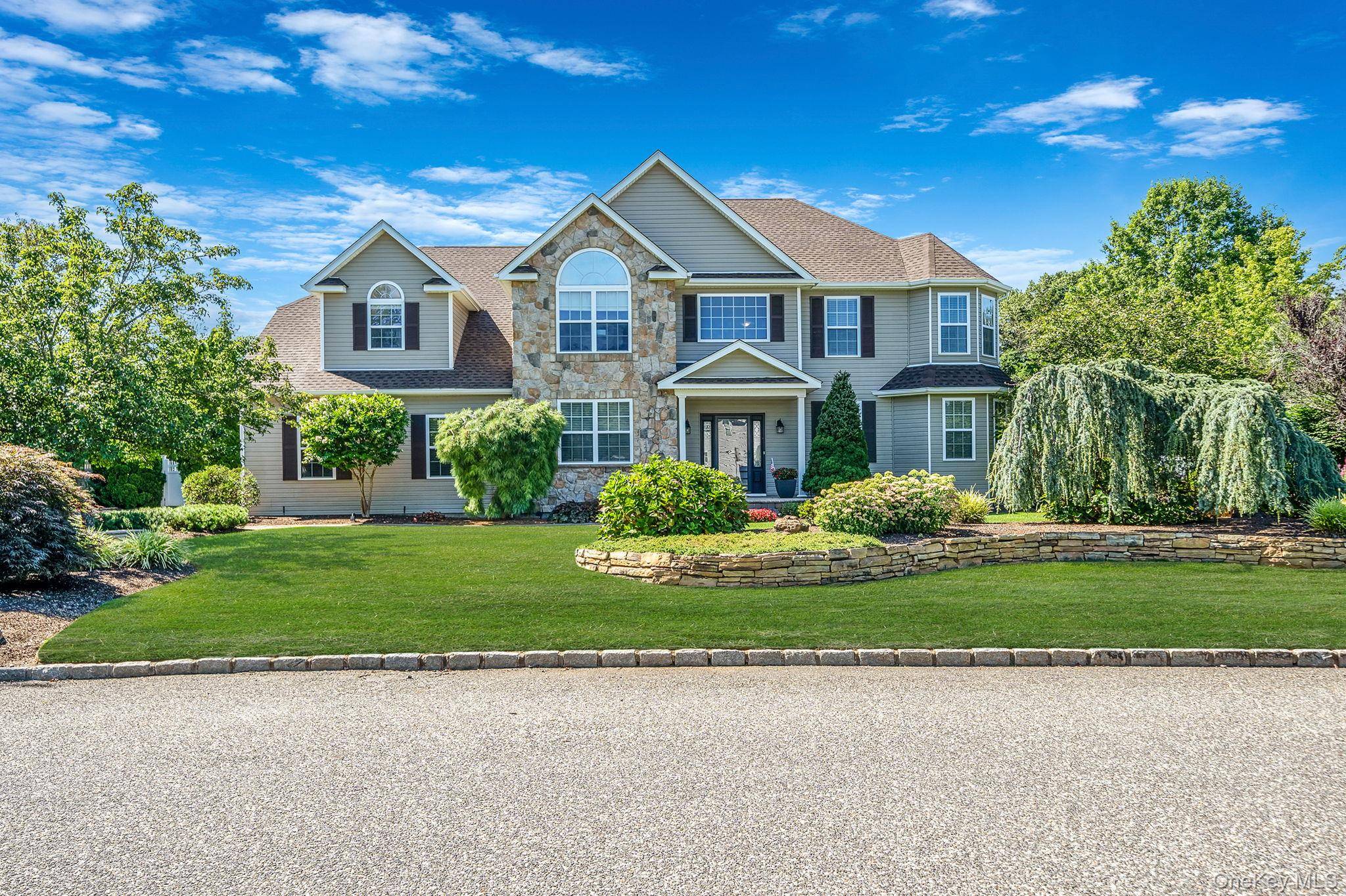 Set on a premium 1. 25 acre parcel in Country Manor Estates, this post modern colonial blends everyday comfort with resort style outdoor living.
