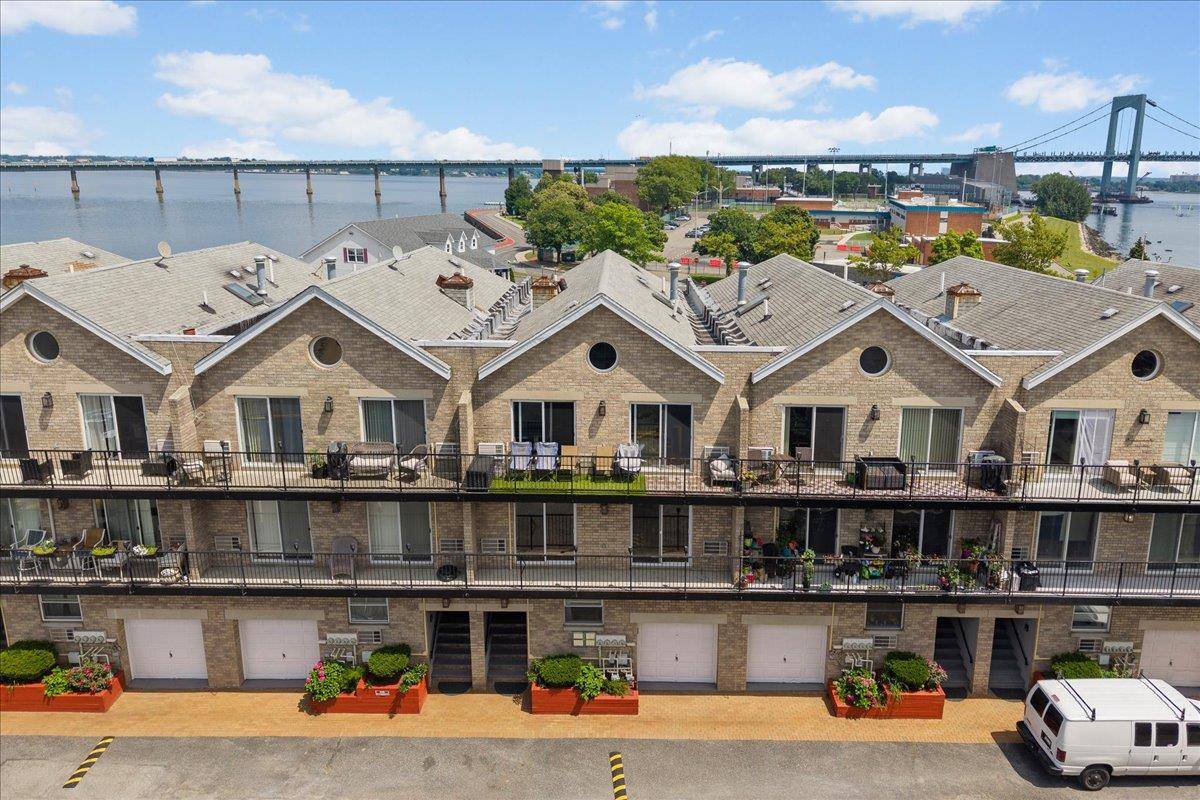 Welcome to a rare Waterfront Oasis in the Bronx 10 Pennyfield Avenue, nestled in the gated Pennyfield Estates.
