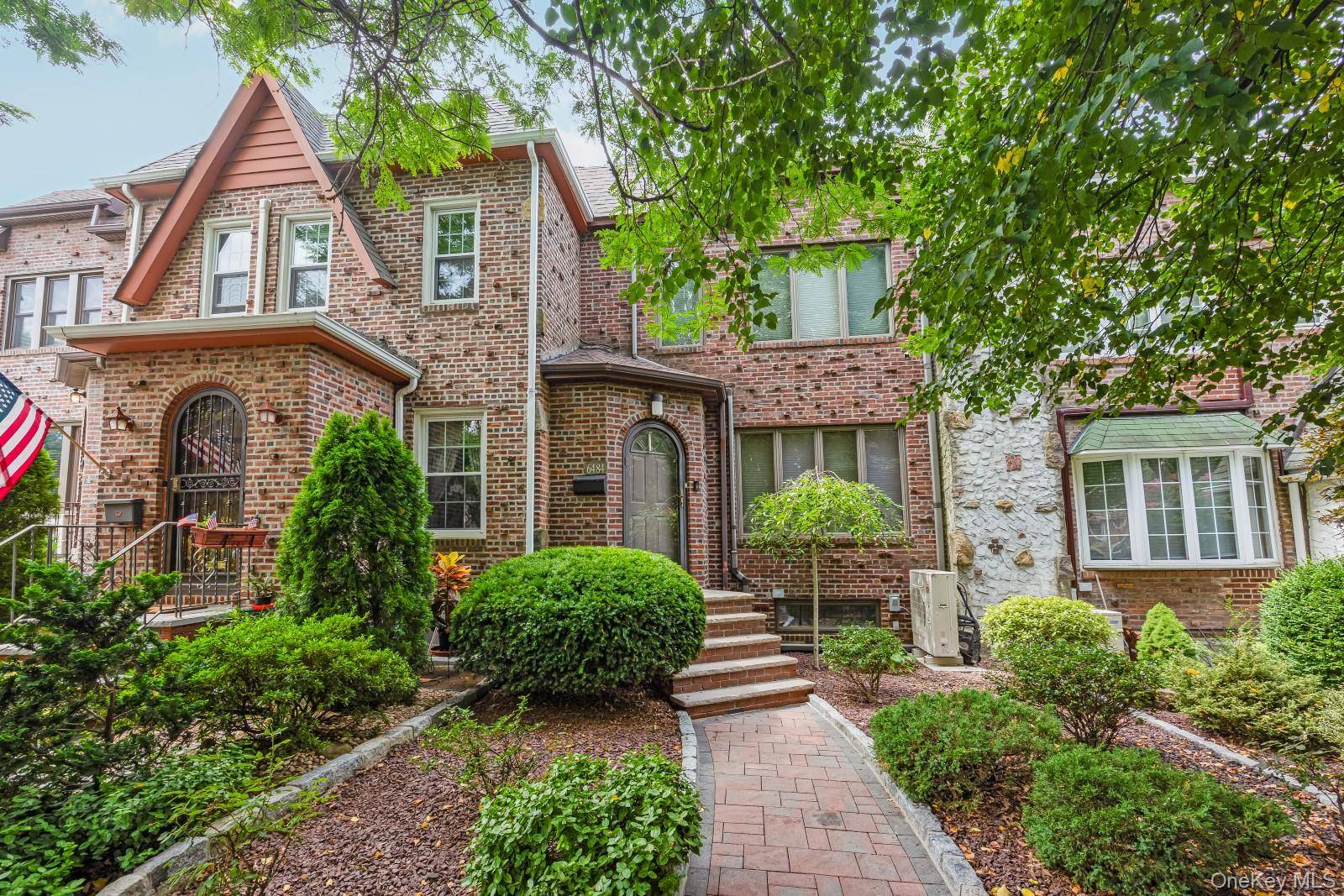 Middle Village N This well maintained 1 family 20 foot brick Tudor style home provides comfort and classic Middle Village charm.