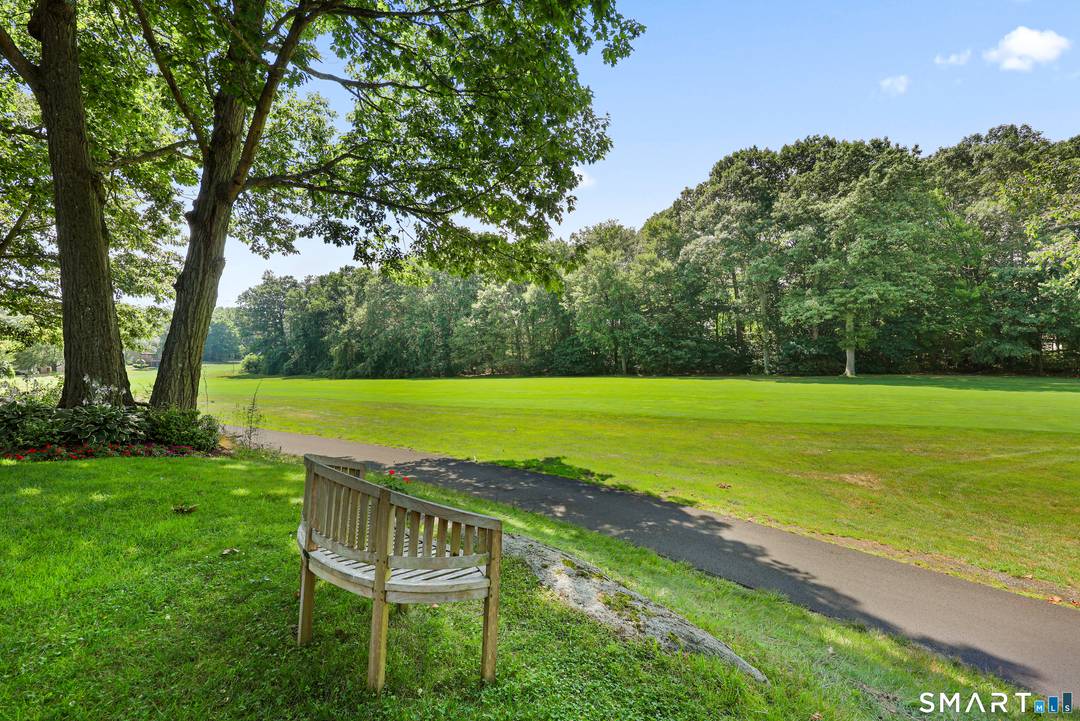 Prime location Wolcott style condo in sought after Oronoque Village, ideally positioned between the 17th and 18th holes with sweeping golf course views and just steps from one of the ...