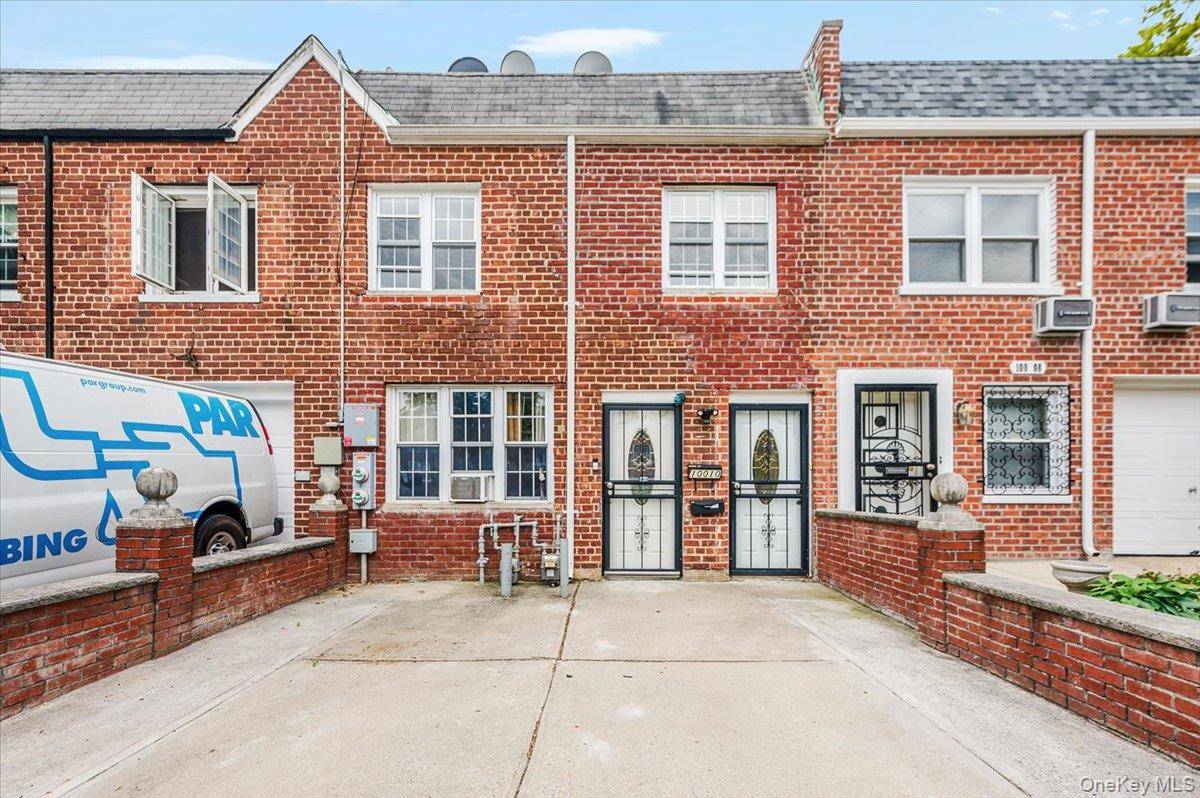 Welcome to this Move in brick attached 2 family home in Ozone Park, Queens.