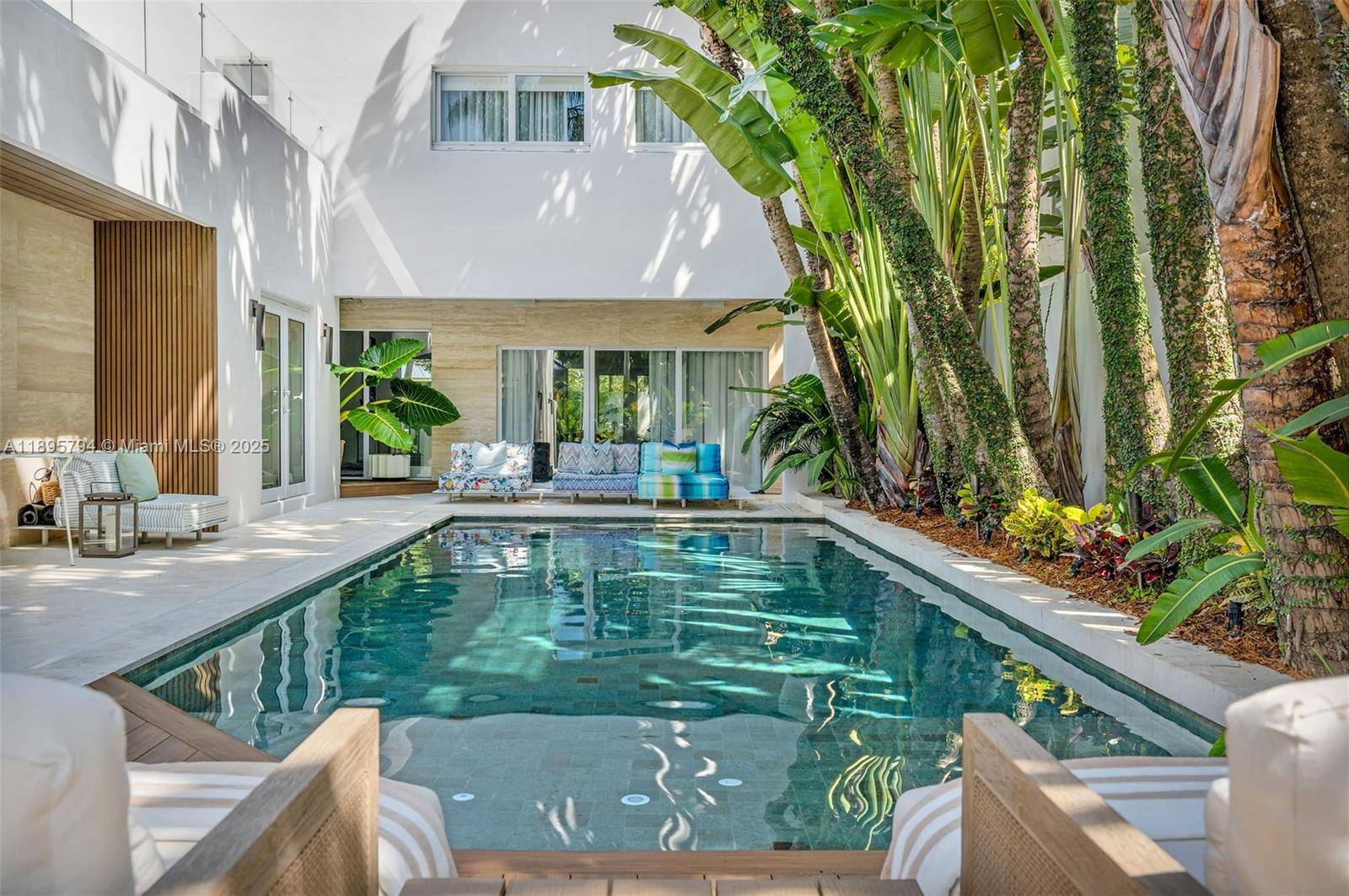 Meticulously remodeled 4Bedrooms 4 Baths sanctuary in prime Coconut Grove.